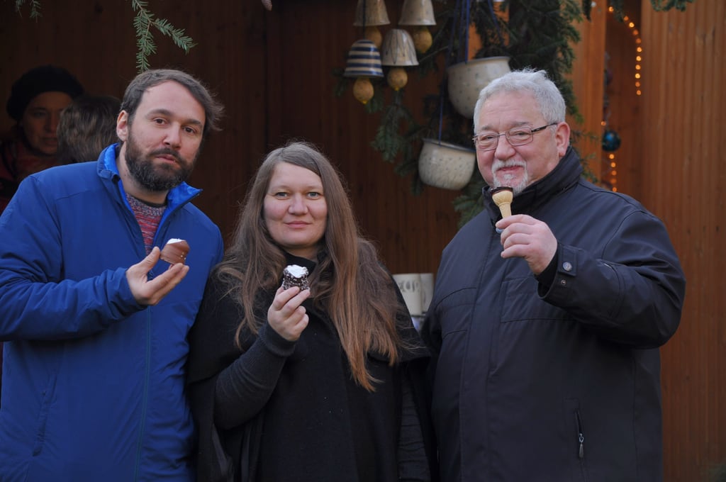 Eating sweets at a christmas market