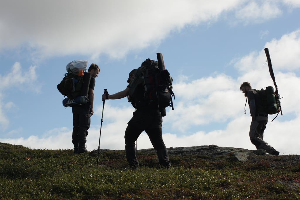 Almost on the top of the mountain with backpacks