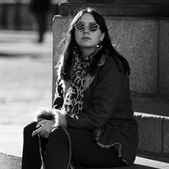 Woman with sunglasses in Gothenburg.