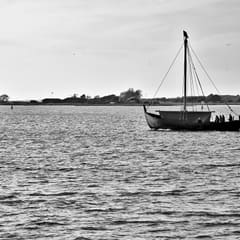 Sailboat leaving horbour