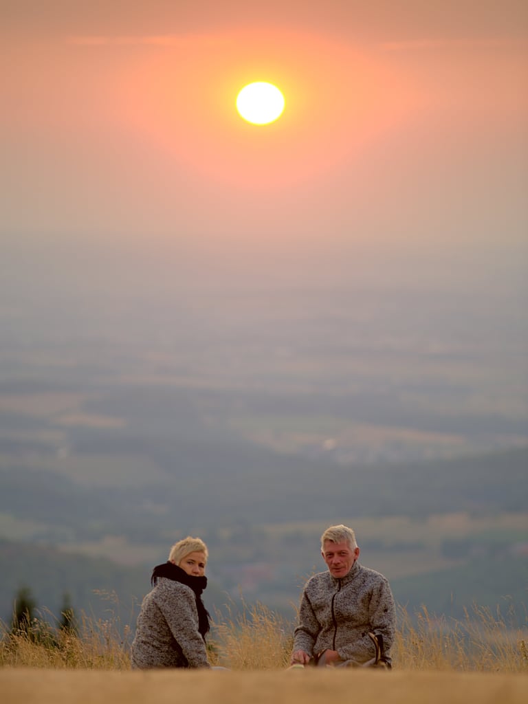Couple enjoying sundown on Wasserkuppe