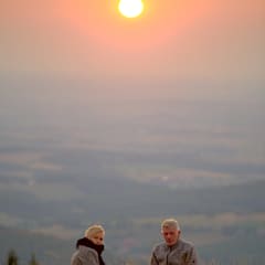 Couple enjoying sundown on Wasserkuppe