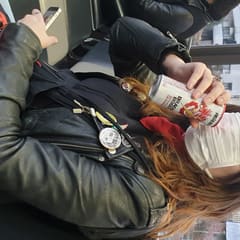 Drinking energy drink on train - Kyoto Japan 2020