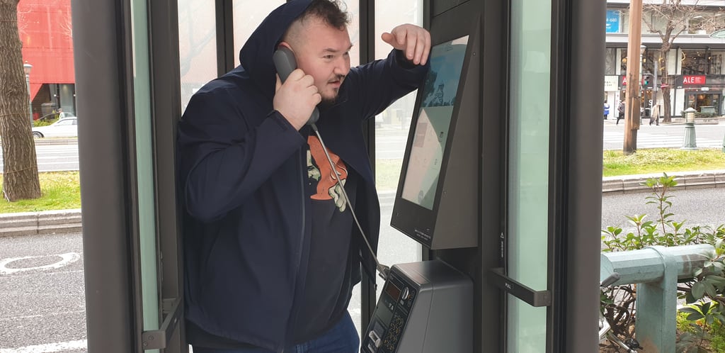 Me on a pay phone in Osaka - Japan 2020