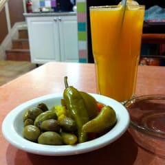Orange juice and olives
